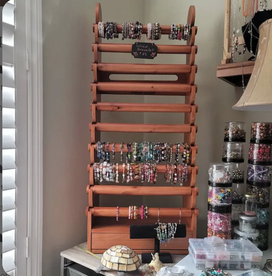 The display fully loaded, packed with woven and beaded bracelets